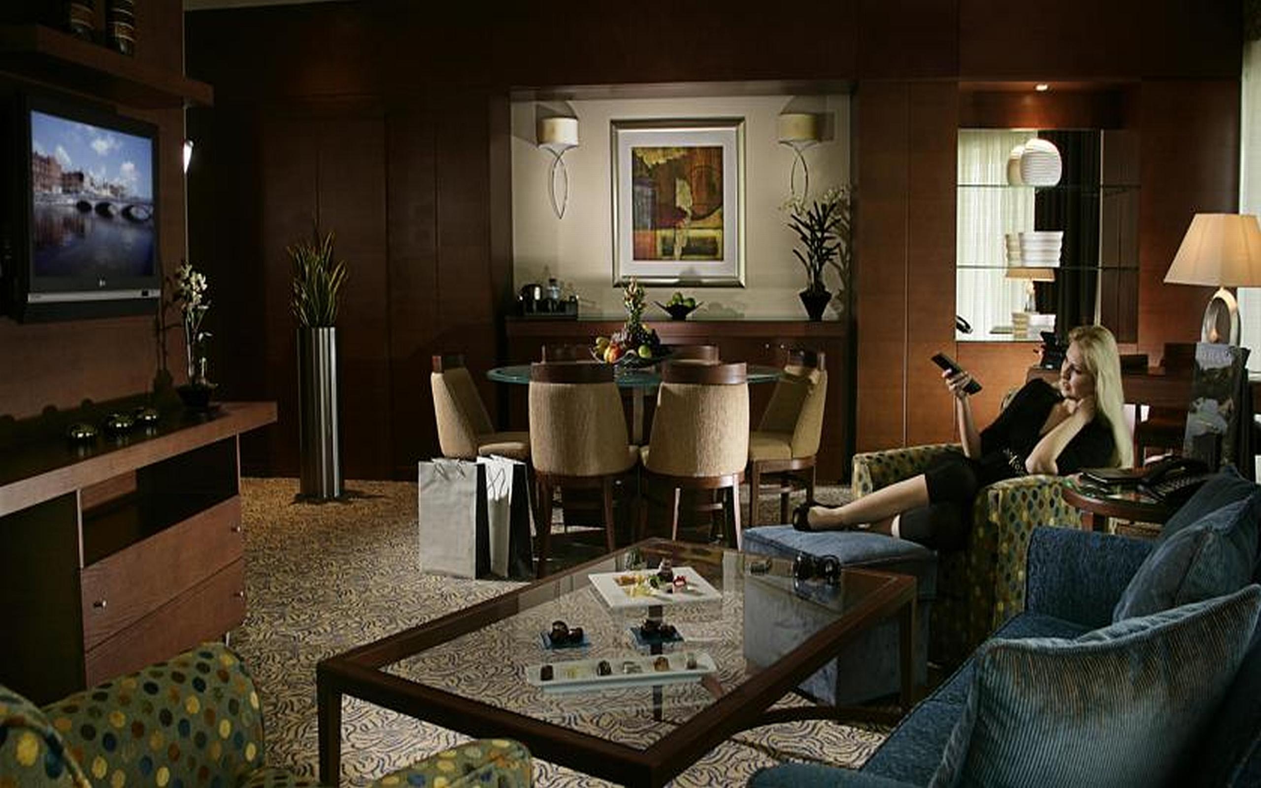 Al Ain Rotana Otel Dış mekan fotoğraf A computer-generated image of a living room
