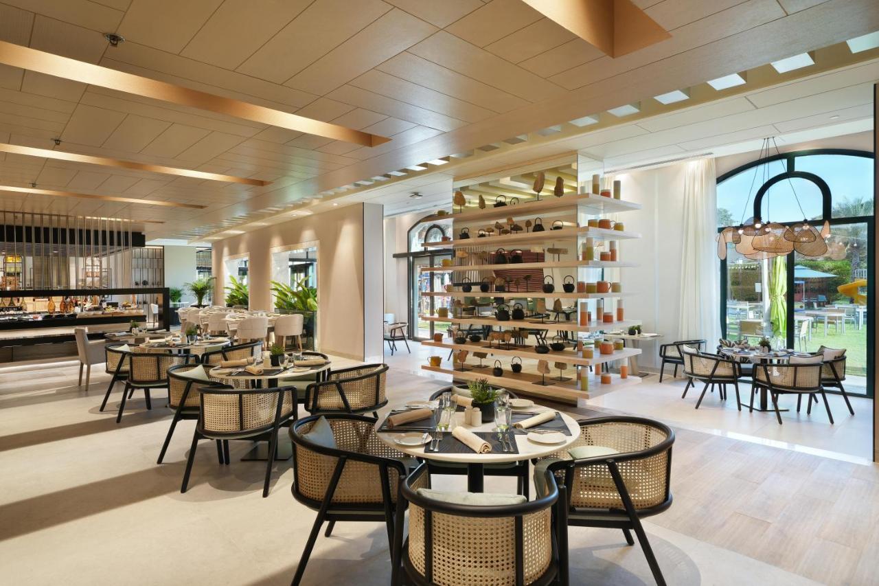 Al Ain Rotana Otel Dış mekan fotoğraf The restaurant